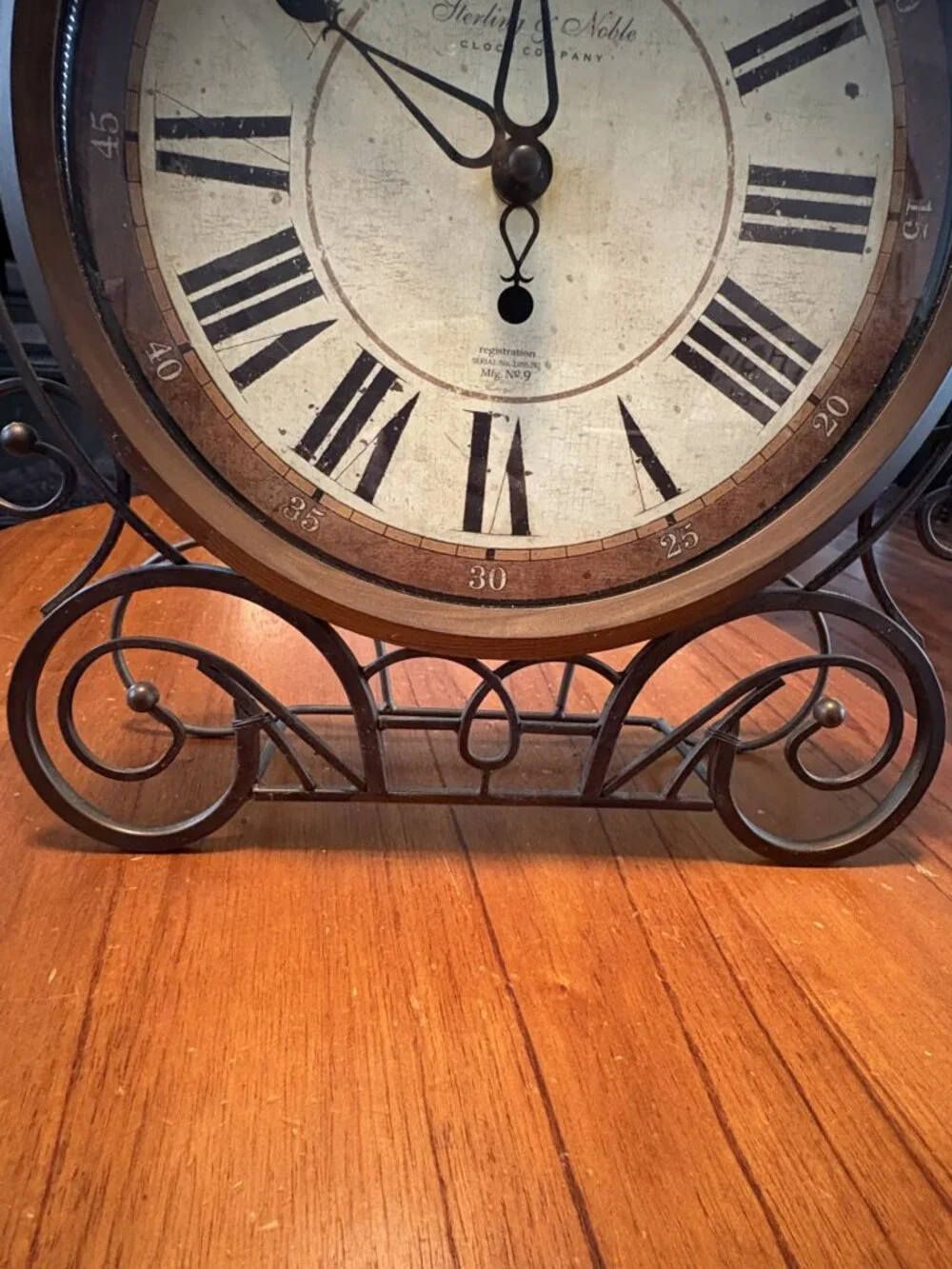 Sterling & Noble Mantel or Wall Clock Decorative Scrollwork Antiqued Face